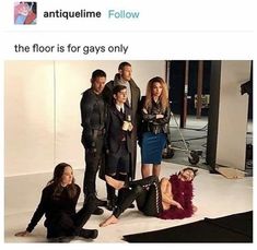 a group of people posing for a photo in front of a white background with text that reads, antauelime follow the floor is for gays only