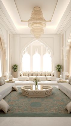 a large living room with white furniture and chandelier