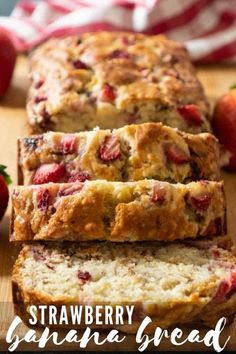 sliced strawberry bread on a cutting board with strawberries