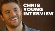 a young man smiling with the words christ young interview in white overlaying him