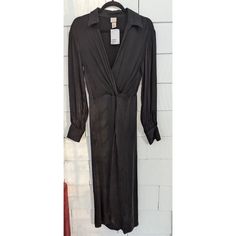 H&M 2 Cupro-Blend Midi Dress Long Sleeve Decorative Wrap-Over Front W Tie Decor * Black * Collared * Sheen To Material * Elasticized Waist * Long Sleeve W/ Loop And Button **Approximate Flat Lay Measurements** Bust: 17" Waist: 13.5" Length: 50" **Material Content** 70% Cupro 30% Rayon **Flaws** None Noted Consideration And Care Are Taken To Ensure That Photos Of All Items Are As True To Color As Possible, However, Due To Inconsistencies Of Various Monitors, Portable And Mobile Device Screens, An Tie Decor, Midi Dress Long Sleeve, Dress H&m, Decor Black, Dress Long Sleeve, H M Dresses, Hm Dress, Long Sleeve Midi Dress, Black Decor