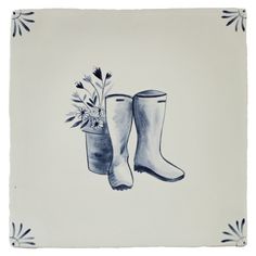 a drawing of boots and flowers on a white background