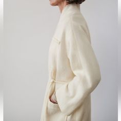 Manteco Wool Coat Zw Collection Worn Once For A Shoot. *Item Runs Large* Zara Woman Collection Wrap Coat Made Of Manteco Wool Fabric. Unfinished Double Lapels. Long Sleeves With Dropped Shoulders. Patch Pockets At Front And Welt Pocket At Chest. Self Tie Belt. Interior Lining Made Of Viscose. White 8288/448 White Sweater Coat For Work, White Sweater Coat For Workwear, White Sweater Coat With Pockets For Work, Zara Cream Cardigan For Work, Zara Cream Cardigan For Workwear, Zara White Long Coat, Classic White Outerwear With Shawl Collar, Classic White Shawl Collar Outerwear, Classic White Sweater Coat For Work