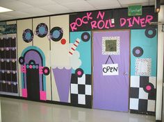 the door to rock'n roll diner is decorated