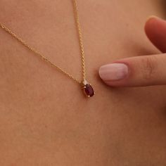 "Gold Ruby Drop Necklace, 14k July Birthstone Gift, Red Gemstone Pendant, Delicate Ruby Cut Necklace, Dainty Ruby, Gold Ruby Jewelry Designed carefully, which will brighten your neck. Our model is quite suitable for everyday use as well as your special day, makes a strong impression with its design, is as stylish as it is ambitious.   All of our products has the stamp \"585\" on them. (which states that this is real gold) Our product weighs 2.57 gr and the chain length is 42 cm. There may be +/- Dainty Gold Ruby Jewelry, July Birthstone Necklace, Dainty Red Jewelry, Ruby Birthstone Jewelry, Real Gemstone Jewelry, Small Ruby Necklace, Dainty Ruby Jewelry, Timeless Gold Necklace, Red Ruby Jewelry