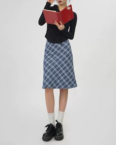 This blue midi skirt features a classic plaid pattern in an A-line silhouette. It has a fitted waistband and falls to the knee, offering a clean, structured look Size:• S: Waist: 64cm/ 25.2 in, Length: 63cm/ 24.8 in• M: Waist: 68cm/ 26.8 in, Length: 64cm/ 25.2 in• L: Waist: 72cm/ 28.3 in, Length: 65cm/ 25.6 inMaterial: Polyester Blue Checked Skirt Outfit, Dark Blue Plaid Skirt Outfit, Softgirl Outfits, Blue Plaid Skirt, Plaid Midi Skirt, Cardigan Y2k, Blue Midi Skirt, 2010s Fashion, Clothes Y2k