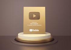 a gold plaque with the youtube logo on it