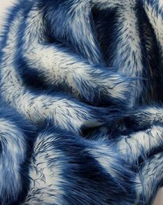 a blue and white fur fabric