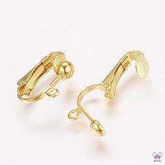 two pairs of yellow gold earrings on a white background, one is open and the other is closed