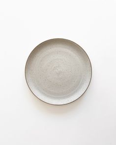 a white plate sitting on top of a table