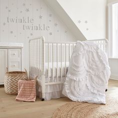 The Skylar Nursery Collection is inspired by Soft Cascading Ruffles. The 4 Piece Crib Bedding Set includes a Quilt, Fitted Sheet, Wall Decal & Crib Skirt/Dust Ruffle. The quilt features tiered, ruched bed skirt, 100% Cotton Crib Fitted Sheet with a simple grey trellis pattern, and wall decal with stars and the words "twinkle twinkle." Adding white accents, this design will transform your child's room! Baby Crib Bedding Sets, Toddler Mattress, Baby Crib Bedding, Nursery Accessories, Crib Sets, Baby Nursery Furniture, Nursery Set, Crib Bedding Sets, Fitted Crib Sheet