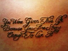 the back of a woman's stomach with an inscription on it that says, you will