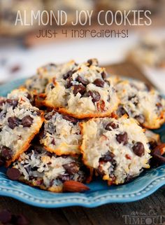 chocolate chip cookies on a blue plate with almonds