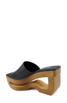 A woodgrain platform with a cutout detail puts an eye-catching spin on this outfit-elevating sandal. 3 1/4" heel; 2" platform Cushioned footbed Leather upper, lining and sole Imported Wooden Heels With Stacked Heel For Spring, Summer Wooden Stacked Heel Heels, Summer Platform Sandals With Wood Material, Modern Wedge Sandals With Wooden High Heel, Modern High Heel Wedge Sandals With Wooden Heel, Wooden Platform Sandals For Summer, Summer Wood Platform Sandals, Summer Wooden Platform Sandals, Summer Wood Platform Heels