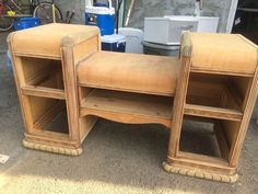 two wooden shelves sitting next to each other