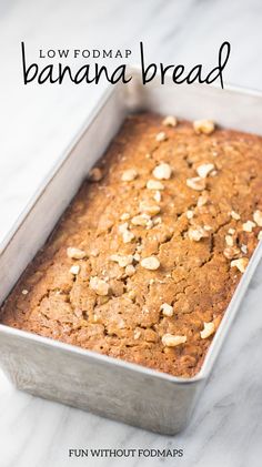 low fodmap banana bread in a pan with text overlay that reads low fodmap banana bread