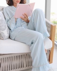 Indulge in ultimate comfort with our Baby Blue Daynaps Pajama. Made of bamboo fabric in stunning azo free dyes, this pajama can be worn day and night. With feminine ruffle details, elastic waist, and button closure, it offers a luxurious fit. Plus, it's machine washable for easy maintenance. The luxurious Baby Blue Daynaps Pajama will be shipped in January 2025. As a special touch, each order includes a beautifully illustrated card and a unique QR code that grants access to a collection of medit Blue Lounging Sets With Long Pants, Blue Sets For Lounging With Long Pants, Blue Lounge Sets With Long Pants, Blue Sleepwear With Elastic Waistband For Relaxation, Blue Pajamas, Bamboo Pajamas, Card Illustration, Bamboo Fabric, Dress Pant