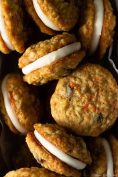 carrot cookies with cream cheese frosting on top