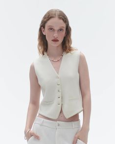 Tailored Vest - Cream – Guest In Residence Guest In Residence, Fitted Vest, Tailored Vest, Trendy Cardigans, Inner Mongolia, Pocket Detail, Brunei, Pullover Sweaters, Sweater Top