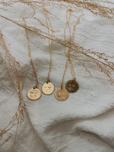 16mm hand stamped brass pendant on a 14k gold filled chain made by me.  This piece can be customized with however many hearts needed for your sisters. A different heart will be filled on each necklace to symbolize that sister/best friend.  Comes in a small black box. Brass will age and patina with time, a small polishing cloth will come with each necklace and will help keep it shiny if wanted!  Please message me with any special requests ☺️ Hand Stamped Heart Jewelry For Friendship, Gold Heart Charm Necklace For Best Friend, Hand Stamped Round Pendant Necklace For Best Friend, Hand Stamped Round Charm Necklace For Best Friend, Cute Gold Friendship Necklace, Gold Heart Charm Necklaces For Friendship, Dainty Hand Stamped Necklaces For Best Friend Gift, Personalized Dainty Necklace For Friendship, Dainty Personalized Necklace For Friendship