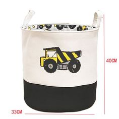 a white and black storage bag with a yellow dump truck design on it's side