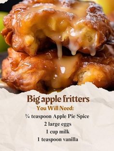 a stack of apple fritters sitting on top of a piece of wax paper