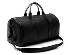 Travel Duffle Bag With Detachable Strap In Black, Luxury Gym Bag With Luggage Sleeve For Travel, Luxury Rectangular Gym Bag For Everyday Use, Luxury Travel Gym Bag With Luggage Sleeve, Functional Duffle Bag With Dust Bag For Travel, Luxury Travel Bag With Removable Pouch For Overnight Trips, Modern Travel Bag With Dust Bag, Modern Travel Bag With Dust Bag Included, Luxury Everyday Gym Bag