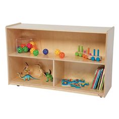 a wooden shelf with toys on it