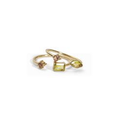 Embrace the essence of charm and elegance with our Precieux Stacking Rings. Showcase the dazzling Peridot and Smokey Quartz gemstones, gracefully set in brass bands. Whether worn individually or stacked together, they exude a sense of sophistication that complements any outfit. Peridot + Smokey Quartz + Brass Smallest Stone: 0.12"DIA Largest Stone: 0.16"L x 0.24"W $76.00 per set SKU 8392-6 The Dazzling, Quartz Gemstones, Brass Band, Smokey Quartz, Stacking Rings, Citrine, Essence, Sense, Brass