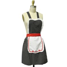 a black and white polka dot apron on a mannequin with red trimming