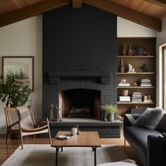 a living room filled with furniture and a fire place