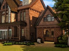 a large wooden house with lots of windows and wood trimmings on the front