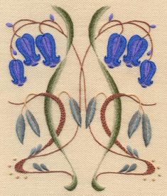 an embroidered design with blue flowers and leaves