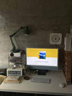 a desktop computer sitting on top of a desk