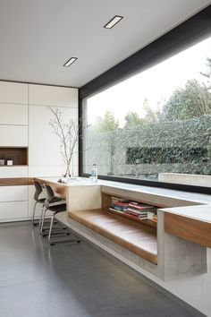 the modern kitchen is clean and ready to be used as a dining room or office