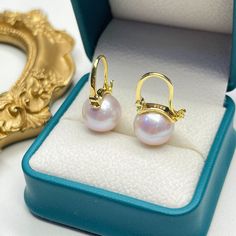 Discover the essence of modern elegance with our Freshwater Pearl Bucket-Shaped Earrings. Each piece features a captivating 11-12mm round freshwater pearl of AAA quality, exuding classic sophistication. Meticulously crafted in 925 sterling silver, with an option for 18k gold vermeil, these earrings showcase a sleek, contemporary design. The distinctive bucket shape combines a minimalist approach with the timeless allure of pearls, creating a versatile accessory ideal for any ensemble. A perfect Double Strand Pearl Necklace, Large Pearl Earrings, Pearl Strands Necklace, Freshwater Pearl Earrings, Purple Pearl, Freshwater Pearl Bracelet, Gold Pearl Earrings, Freshwater Pearls Earrings, Pearl Set