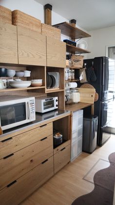 the kitchen is clean and ready for us to use it's microwave, dishwasher, and toaster oven