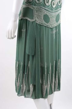 For Sale on 1stDibs - MADELEINE VIONNET c.1924 “Little Horses” Soft Green White Glass Beaded Flapper Dress Circa: 1924 Designer: Madeleine Vionnet Style: Flapper drop waist 1920s Embellished Summer Dresses, 1920s Style Embellished Summer Dresses, Embellished 1920s Style Summer Dresses, Art Deco Embellished Dresses For Vintage Style, 1920s Beaded Evening Dress, Summer Art Deco Embellished Dresses, Vintage Beaded Silk Dress, Vintage Embellished Green Dresses, Vintage Green Embellished Dress