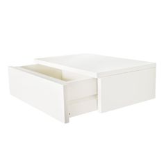 a white table with two drawers on the bottom and one drawer open to show its contents