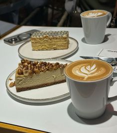 there are two desserts on the table next to each other, and one has a cup of coffee