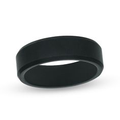 a black wedding ring on a white background