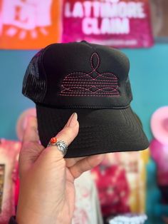 *online exclusive*This adorable trucker cap is embroidered with a western style "Boot Stitch" on the front panel. SO MANY Colors to choose from! 100% Polyester Front 100% Polyester Mesh Back The Traditional Look 5-panel cap Seamless Foam Front Panel with Matching Color Sweatband Plastic Adjustable Snap in the back. One Size Fits Most *ships from warehouse *not available to pickup in store same day Unique Boots, Black Trucker Hat, Hats Black, Western Style Boots, Black Hot Pink, Western Boot, Black Hat, Shoe Charms, Green Turquoise