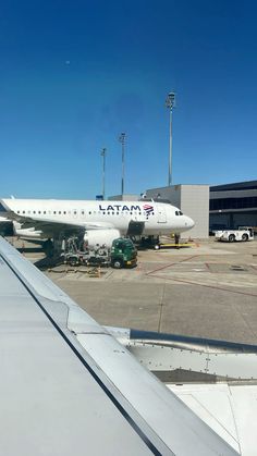 an airplane that is sitting on the tarmac