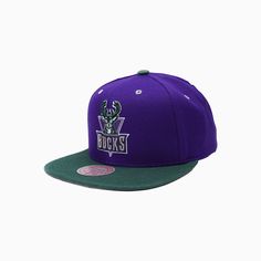 Overview: Mitchell & Ness Milwaukee Bucks NBA Reload Snapback Hat features polyester wool crown and top visor, contrast under visor, raised and flat embroidery front logo & snap closure. Features: Material: 100% Polyester Wool Color: PURPLE Style: 6HSSJS19207-MBUPURP Purple Style, Milwaukee Bucks, Purple Fashion, Mitchell & Ness, Snapback Hat, Snapback Hats, Milwaukee, Color Purple, Nba