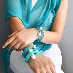 Cuff bracelet in aqua shades with white beads, Contemporary stylish bracelet, Wrist jewelry, Fashion bracelet, Bohemian art style bracelet. Simple effective contemporary cuff bracelet in gorgeous aqua shadews with white beads. Bracelet is breathable, hypoallergenic, comfortable to wear. Easy to put on and take of casual style modern bracelet for any occasion or dressing style, from elegant to sporty. Size: Bracelet is on memory wire and adapts to all sizes of wrist. Please send me a message if you have any questions or doubts. I will gladly answer to you. Search out my shop maybe you will find something for your loved ones or for you. Best regards Ivana. Modern Bracelet, Bracelet Wrist, Modern Bracelets, Wrist Jewelry, Bracelet Simple, Dressing Style, Bohemian Art, Stylish Bracelet, Memory Wire