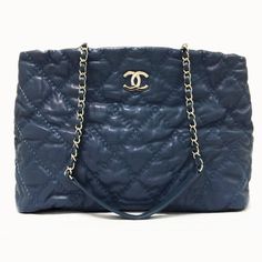 Description: Color: Denim Blue Type Of Material: Quilted Leather Color Of Hardware: Silver Tone Hardware Type Of Closure: Open Top Closure Type Of Strap: Chain Leather Straps With 12” Drop Exterior Details: - Chanel Cc Interlocking Logo In Gunmetal Hardware - Bottom With Feet Interior Information: - Fully Lined - Middle Zip Compartment - Dual Slip Pocket - Single Zip Pocket - Key Fob Serial Tag #: 17824027 (This Serial Number Signifies That This Chanel Bag Is From The Year 2012-2013) Condition: - Minor Scuffs On Hardware - Minor Discolorations On Interior - Light Leather Creasing On Bags Exterior - Slight Areas Of Pulled Stitching On Bags Exterior Chanel Gst, Chanel Canvas, Chanel Reissue, Navy Chanel, Chanel Tote Bag, Vintage Tote Bag, Blue Tote, Black Leather Tote, Quilted Leather