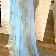 This Shawl Makes Any Simple Outfit Look Stunning. A Light Cashmere Sky Blue And Gold & Blue Lace. It Is Long And Wide 37” Wide By 78” Long Elegant Blue Dupatta For Evening, Elegant Evening Blue Dupatta, Elegant Blue Dupatta For Party, Elegant Blue Dupatta For Wedding, Blue Silk Dupatta For Formal Occasions, Formal Blue Silk Dupatta, Elegant Light Blue Dupatta For Party, Elegant Blue Silk Dupatta, Simple Outfit