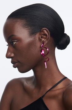 Jazz up your night-out look with twisted ribbon drop earrings handcrafted from recycled metal with a glossy ceramic finish. 2 3/4" drop; 1/2" width   Post back   Recycled metal/ceramic   Made in the USA Pink Twists, Ribbon Earrings, Suede Jewelry, Pink Emerald, Beaded Drop Earrings, Metallic Pink, Fuchsia Color, Emerald Earrings, Crystal Drop Earrings