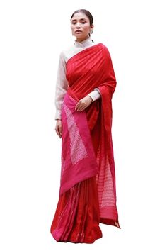 Red and rani silk cotton saree with hand dyed triangular pattern pallu with hand done Bandhani and mirror work. Comes with off white silk unstitched blouse piece in gold and satin tissue stripes. - Aza Fashions Red Cotton Silk Pre-draped Saree With Dupatta, Red Cotton Silk Pre-draped Saree For Designer Wear, Festive Red Cotton Silk Pre-draped Saree, Red Cotton Silk Pre-draped Saree, Red Slub Silk Pre-draped Saree With Dupatta, Festive Red Cotton Silk Saree, Unstitched Red Cotton Silk Saree, Red Cotton Silk Blouse For Navratri, Red Cotton Silk Pre-draped Saree With Cutdana