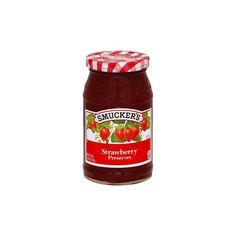 a jar of strawberry preserves on a white background